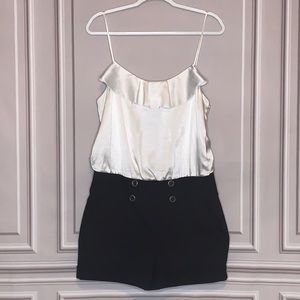 Size 13 Grass Collection romper. Adjustable straps